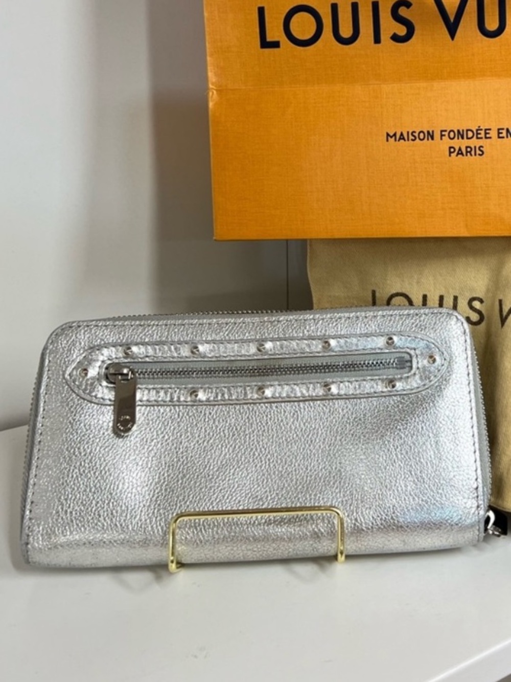 Louis Vuitton Metallic Silver Suhali Goatskin Zippy Wallet with dust bag 🔥